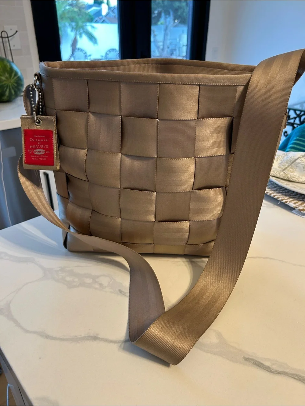 Harvey’s The Original Crossbody Shoulder Bag - Taupe. 13” x 11” x 4”